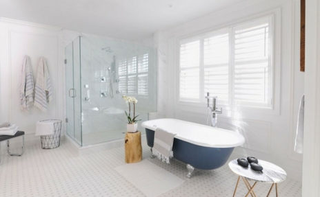 Daltile bathroom floor with clear shower.